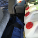 Compressor on top of general tool kit behind drivers eat. Cooking bag on top of dutch over behind passengers seat.